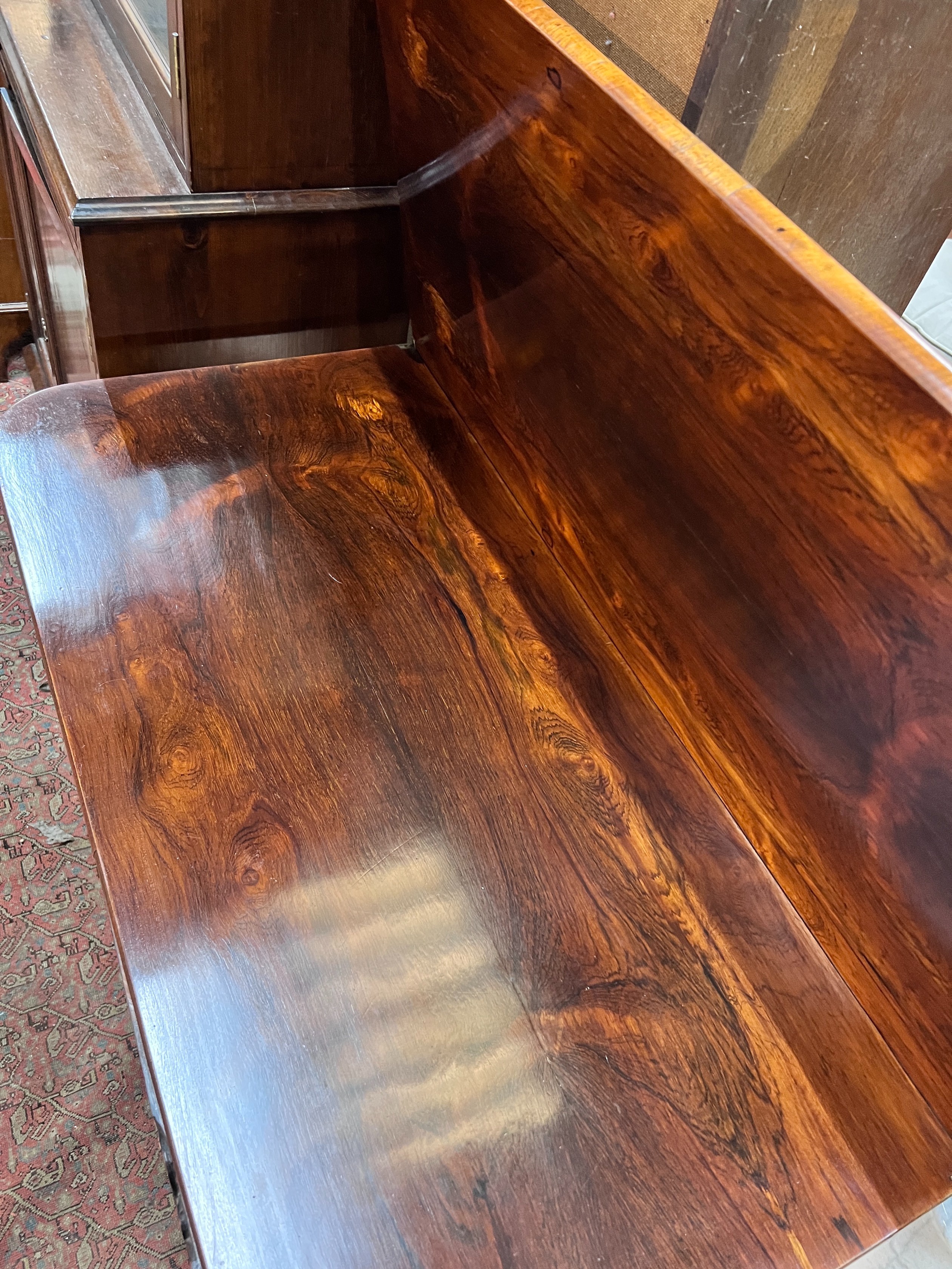 An early Victorian rectangular rosewood folding tea table, width 91cm, depth 45cm, height 72cm *Please note the sale commences at 9am.